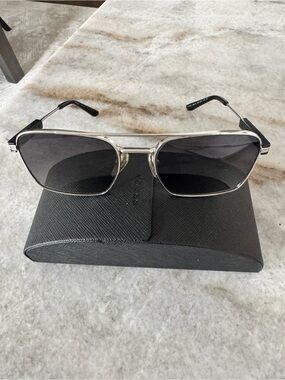 Prada Woman’s Silver Frame Black Lens Sunglasses